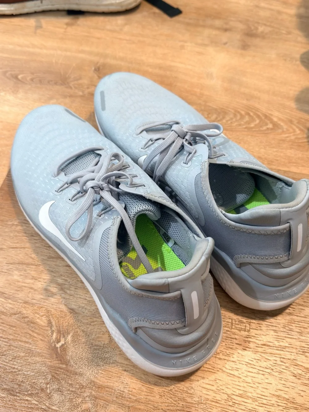 Nike Light Gray Sneakers with Neon Yellow-Green Insole